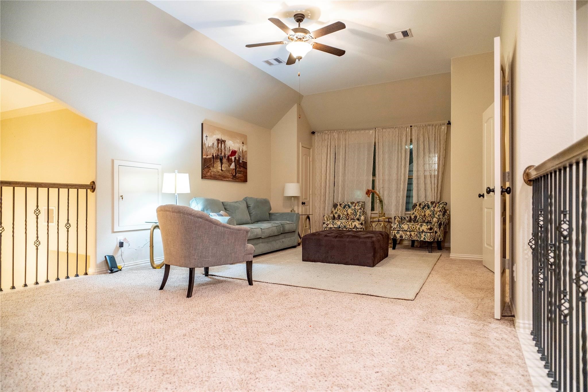 2727 Richmond Ridge Lane Katy, TX 77494 - Photo 26 of 50 a living room with furniture and a ceiling fan