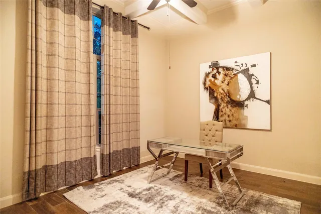 a work room with a table and chairs