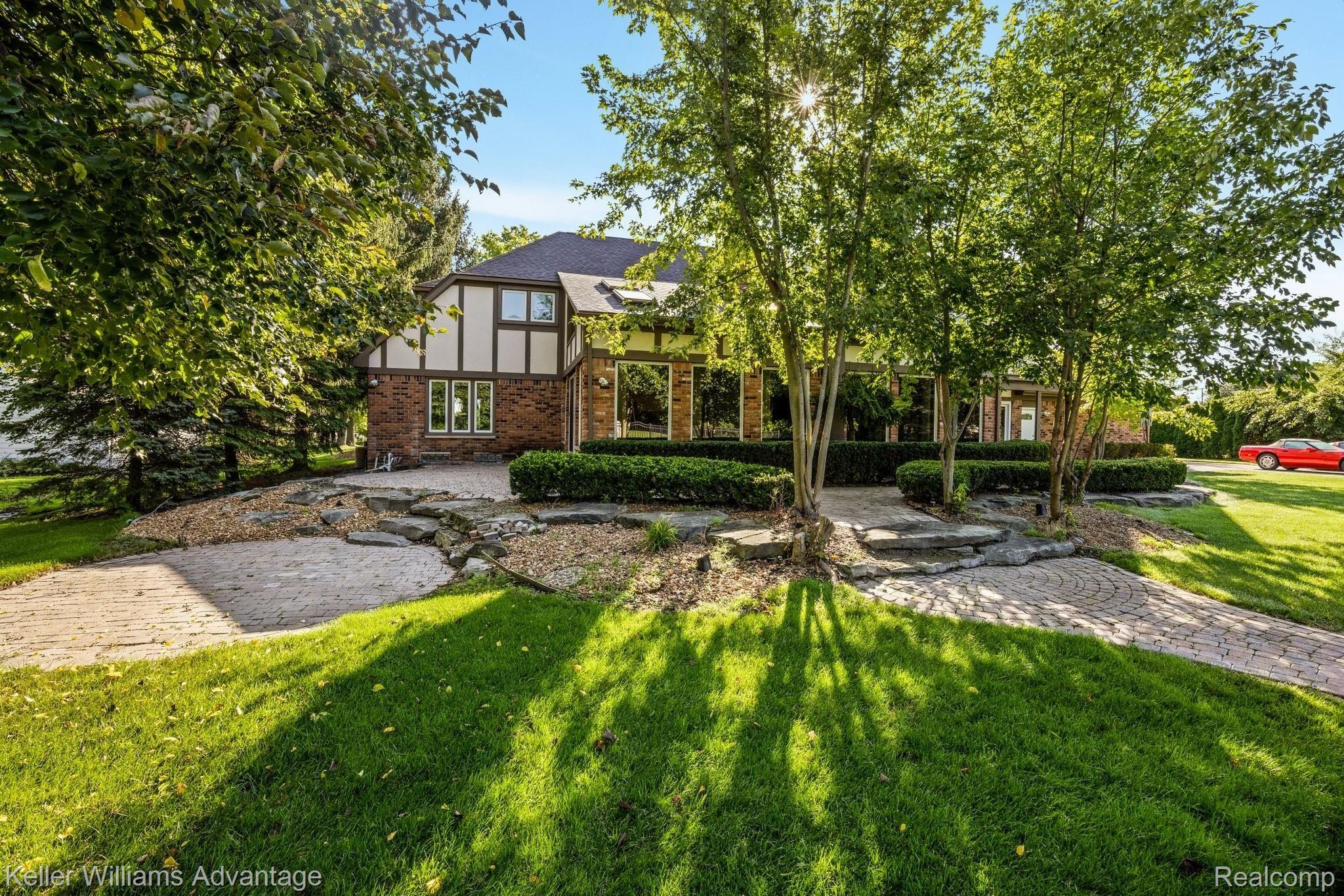 38125 Hayes Road Sterling Heights, MI 48313 - Photo 57 of 83 Rear Tudor style elevation does not disappoint