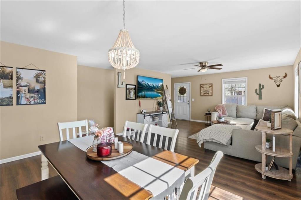 100 South Avery Road Southwest Rome, GA 30165 - Photo 20 of 50 a living room with furniture chandelier and a table
