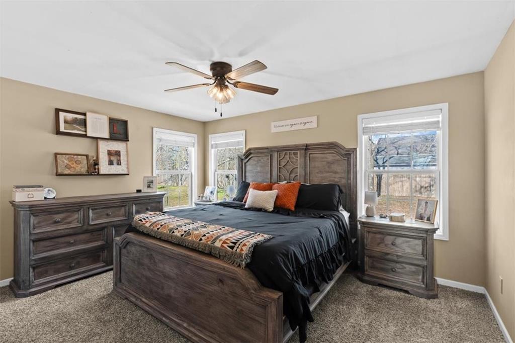 100 South Avery Road Southwest Rome, GA 30165 - Photo 21 of 50 a bedroom with a bed and a window