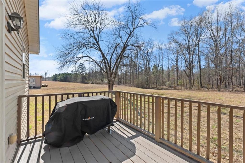 100 South Avery Road Southwest Rome, GA 30165 - Photo 28 of 50 a view of balcony with wooden floor and fence