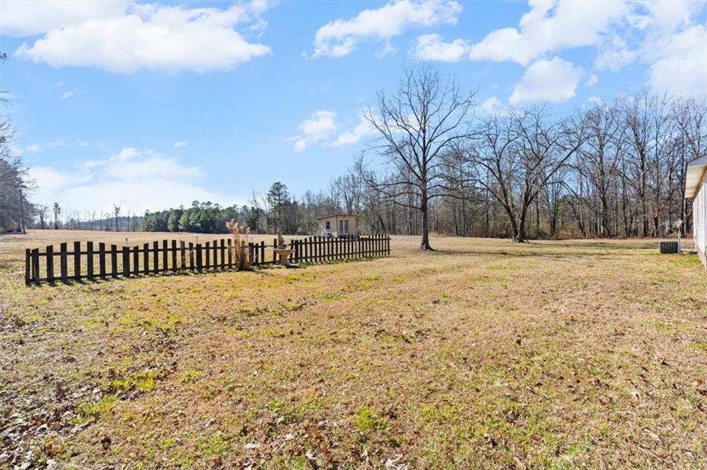 100 South Avery Road Southwest Rome, GA 30165 - Photo 35 of 50 a view of a yard covered in snow