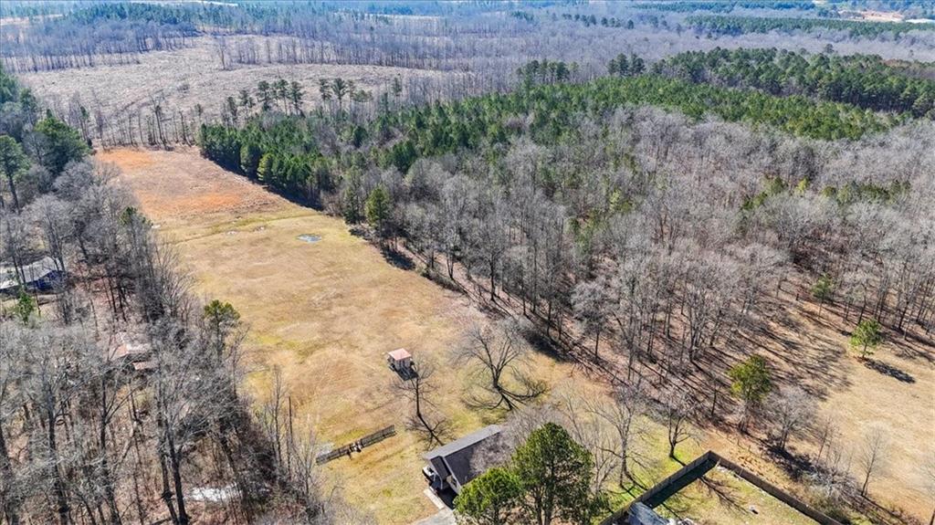 100 South Avery Road Southwest Rome, GA 30165 - Photo 42 of 50 a view of a dry yard with trees