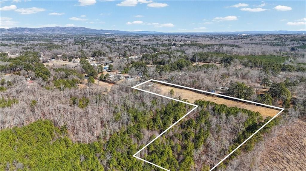 100 South Avery Road Southwest Rome, GA 30165 - Photo 45 of 50 an aerial view of house with yard and mountain in the background
