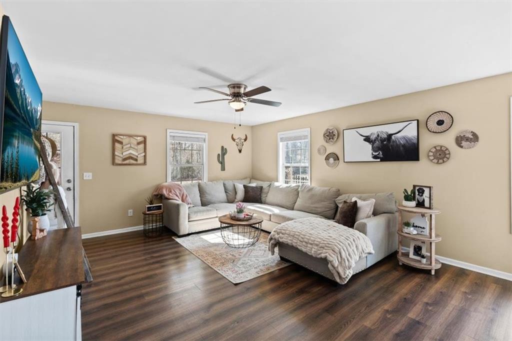 100 South Avery Road Southwest Rome, GA 30165 - Photo 8 of 50 a living room with furniture and a flat screen tv