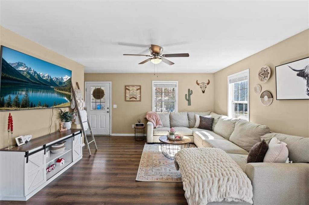 100 South Avery Road Southwest Rome, GA 30165 - Photo 9 of 50 a living room with furniture and a flat screen tv