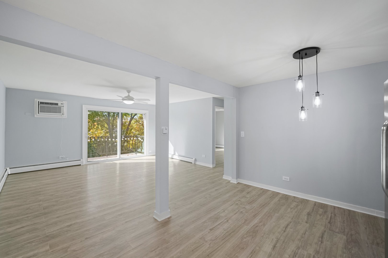 4819 West Engle Road, Unit 3D Alsip, IL 60803 - Photo 11 of 19 a view of an empty room with wooden floor and a window