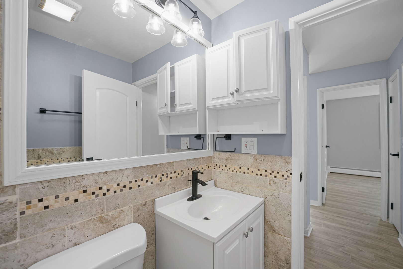 4819 West Engle Road, Unit 3D Alsip, IL 60803 - Photo 15 of 19 a bathroom with a sink and a mirror