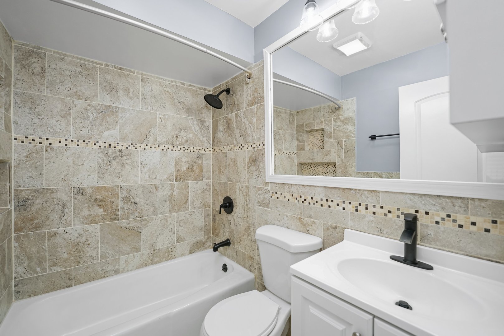 4819 West Engle Road, Unit 3D Alsip, IL 60803 - Photo 16 of 19 a bathroom with a sink and a bathtub
