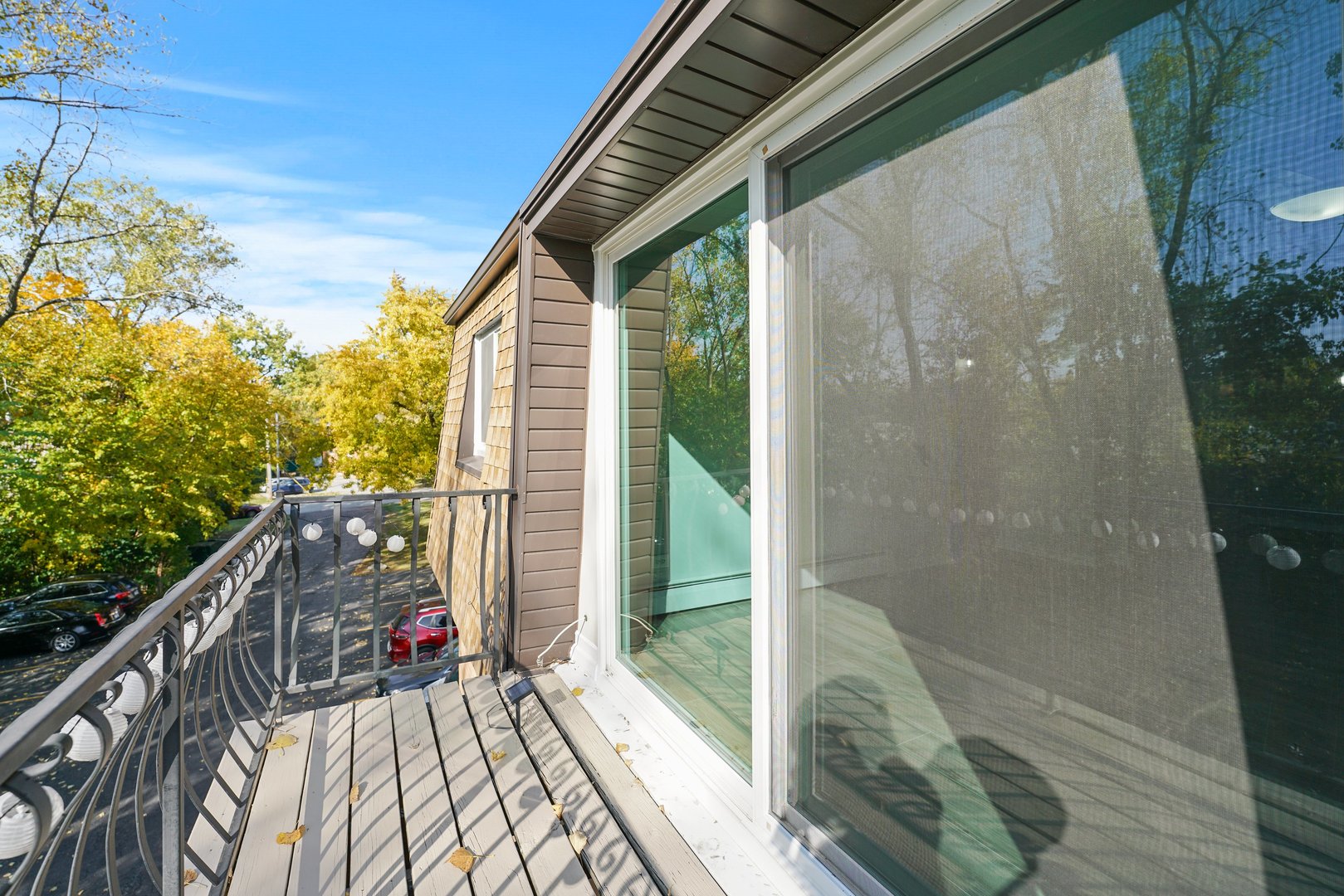 4819 West Engle Road, Unit 3D Alsip, IL 60803 - Photo 17 of 19 a view of balcony with floor to ceiling window and wooden fence
