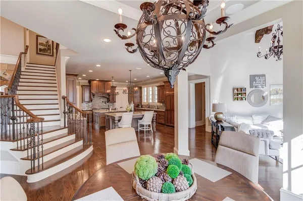 a white toilet sitting next to a bathroom sink