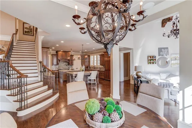 a white toilet sitting next to a bathroom sink