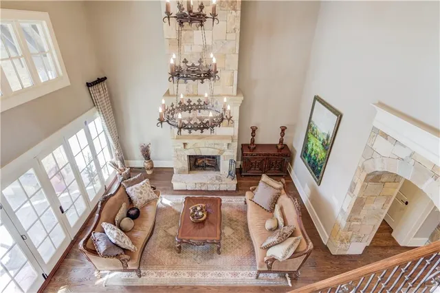 a bedroom with a bed and a mirror