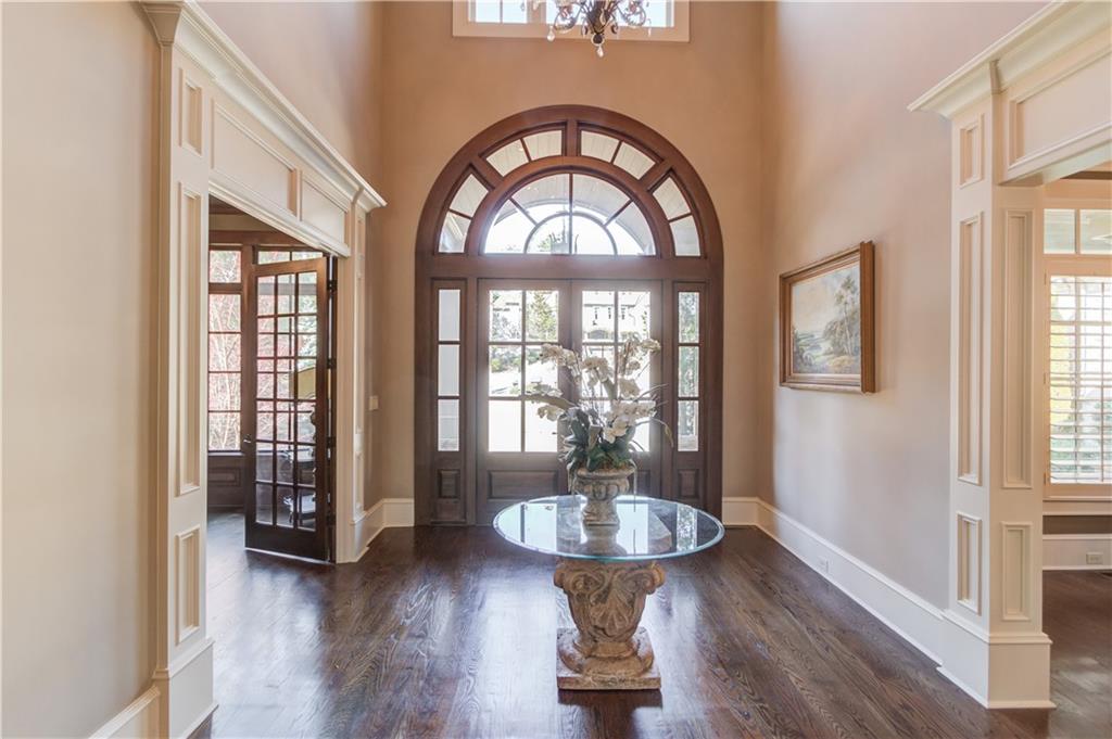 922 Little Darby Lane Suwanee, GA 30024 - Photo 7 of 109 a view of a livingroom with furniture window and wooden floor