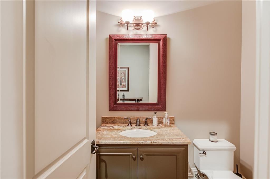 922 Little Darby Lane Suwanee, GA 30024 - Photo 79 of 109 a bathroom with a sink and a toilet