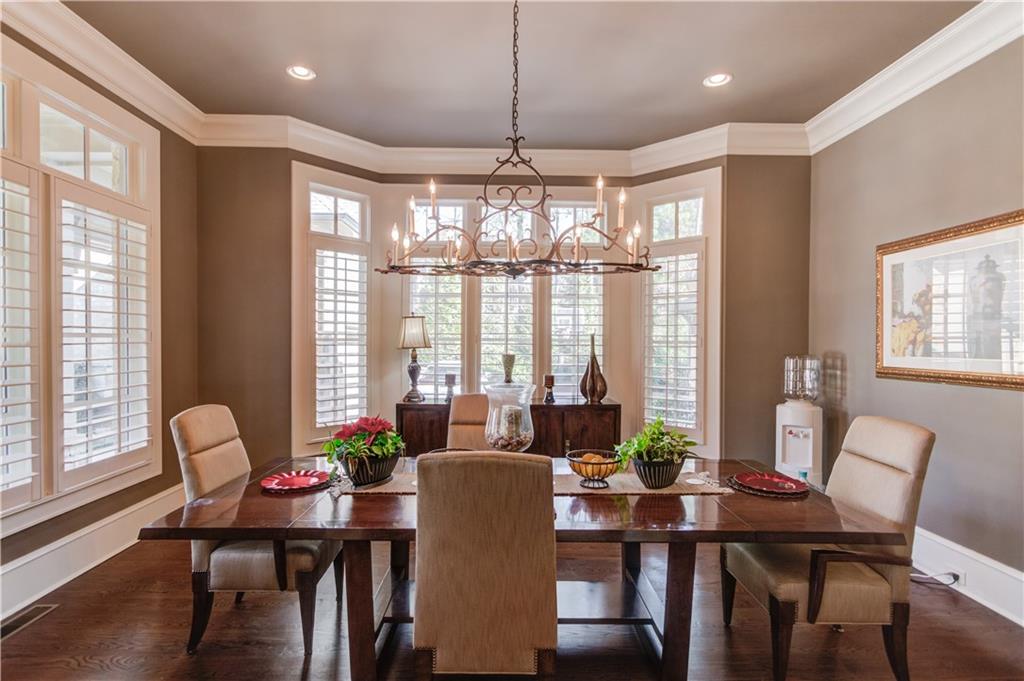 922 Little Darby Lane Suwanee, GA 30024 - Photo 9 of 109 a view of a dining room with furniture window and outside view