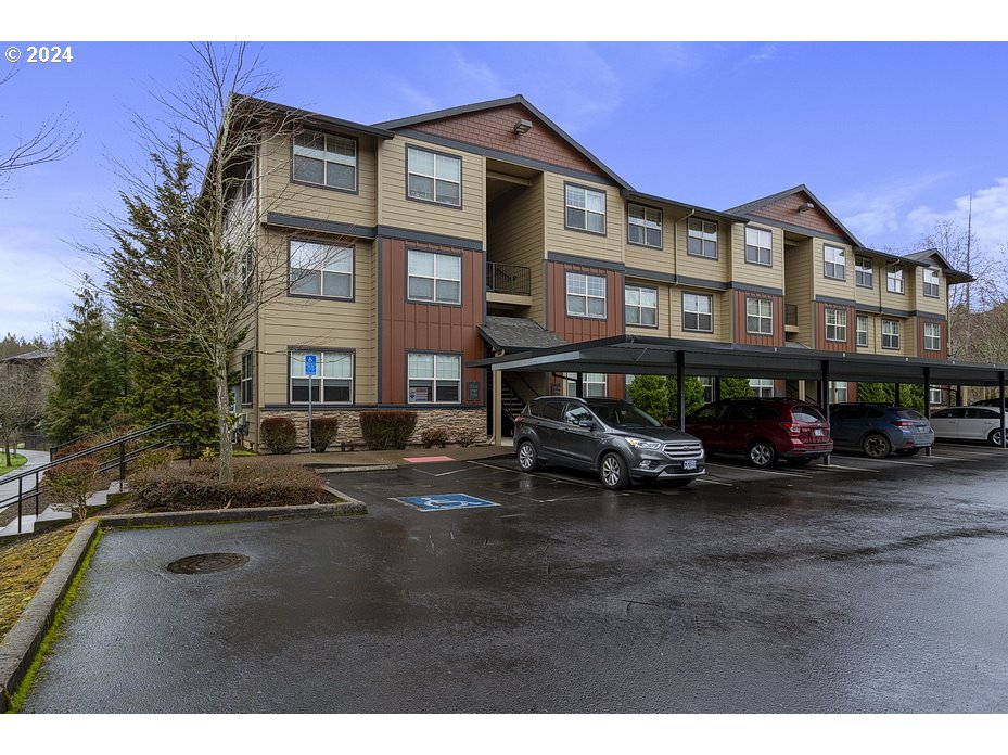a view of a street with cars