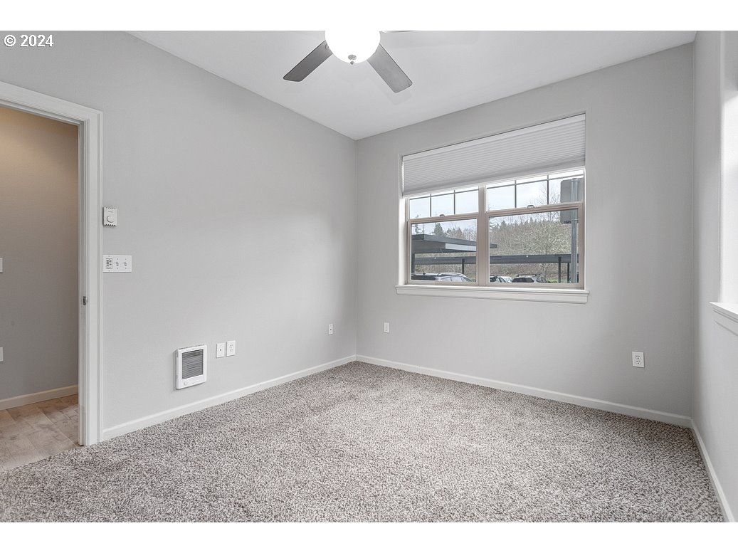 17301 Ruben Lane, Unit 10 Sandy, OR 97055 - Photo 18 of 33 a view of an empty room with a window