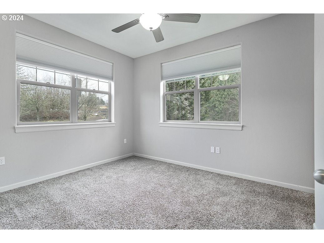 17301 Ruben Lane, Unit 10 Sandy, OR 97055 - Photo 22 of 33 a view of an empty room with a window
