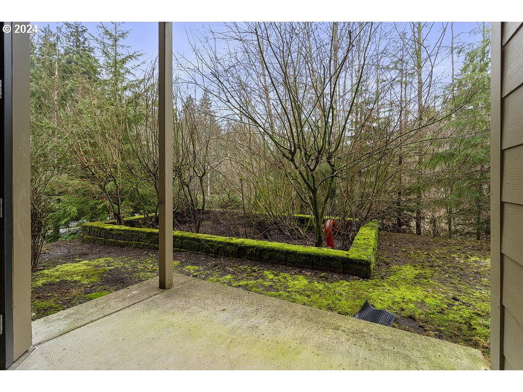 17301 Ruben Lane, Unit 10 Sandy, OR 97055 - Photo 29 of 33 a view of a backyard with large trees