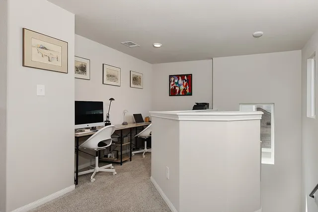 a workspace with furniture and a workspace