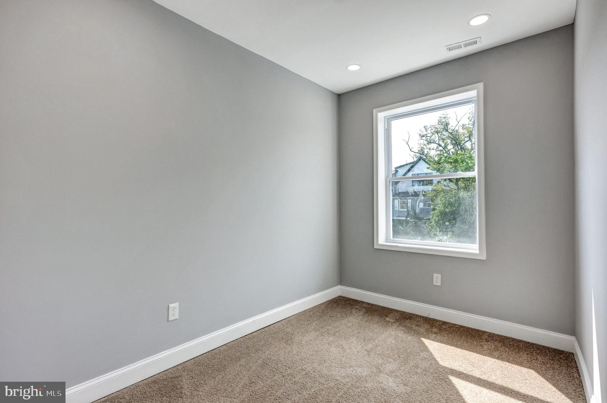 3816 Bonner Road Baltimore, MD 21216 - Photo 11 of 36 an empty room with a window
