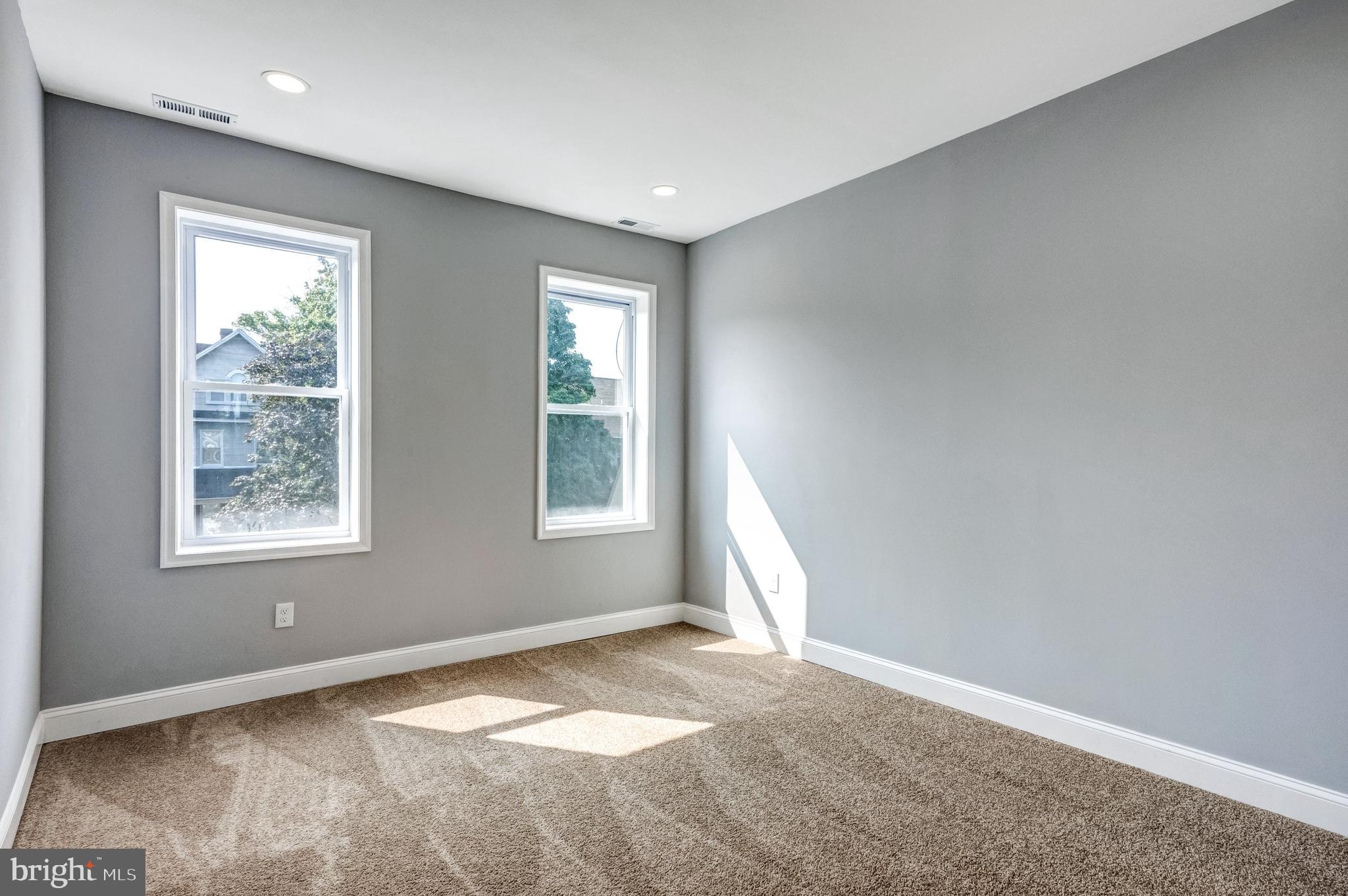 3816 Bonner Road Baltimore, MD 21216 - Photo 13 of 36 an empty room with windows