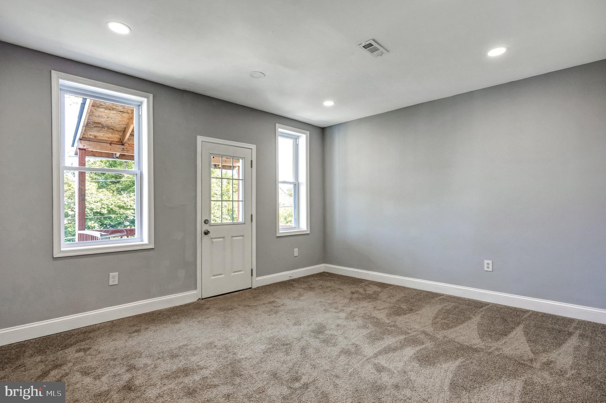 3816 Bonner Road Baltimore, MD 21216 - Photo 19 of 36 a view of an empty room with a window