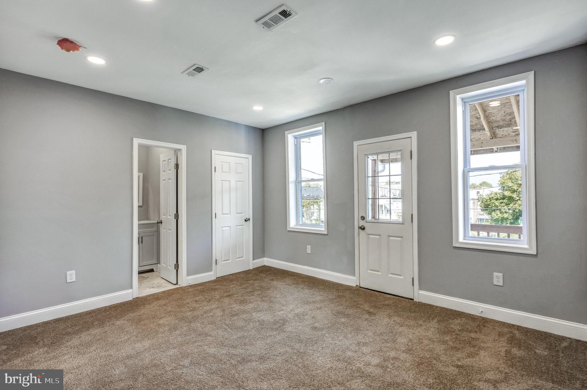 3816 Bonner Road Baltimore, MD 21216 - Photo 20 of 36 a view of an empty room with a window
