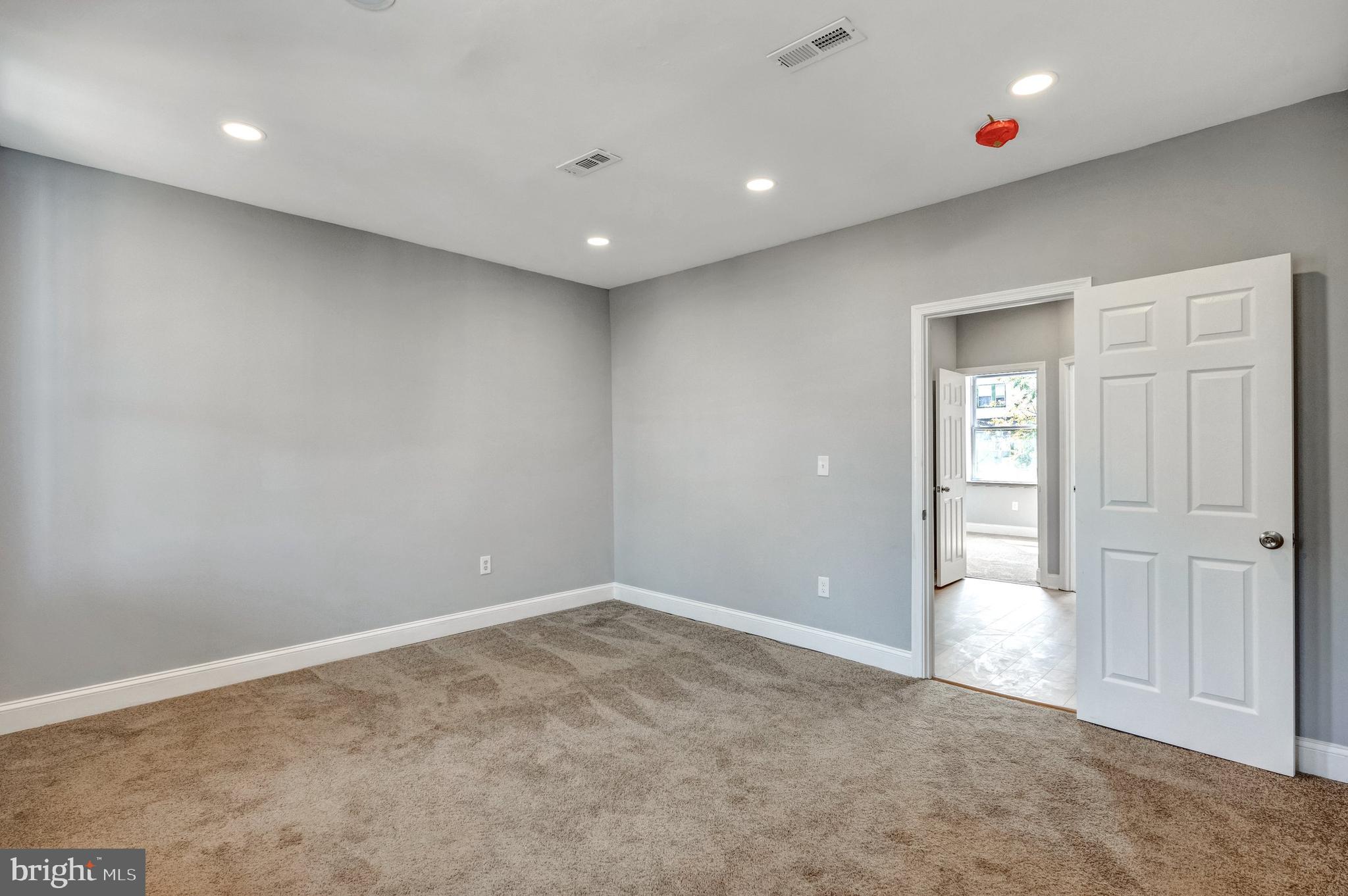 3816 Bonner Road Baltimore, MD 21216 - Photo 22 of 36 a view of an empty room
