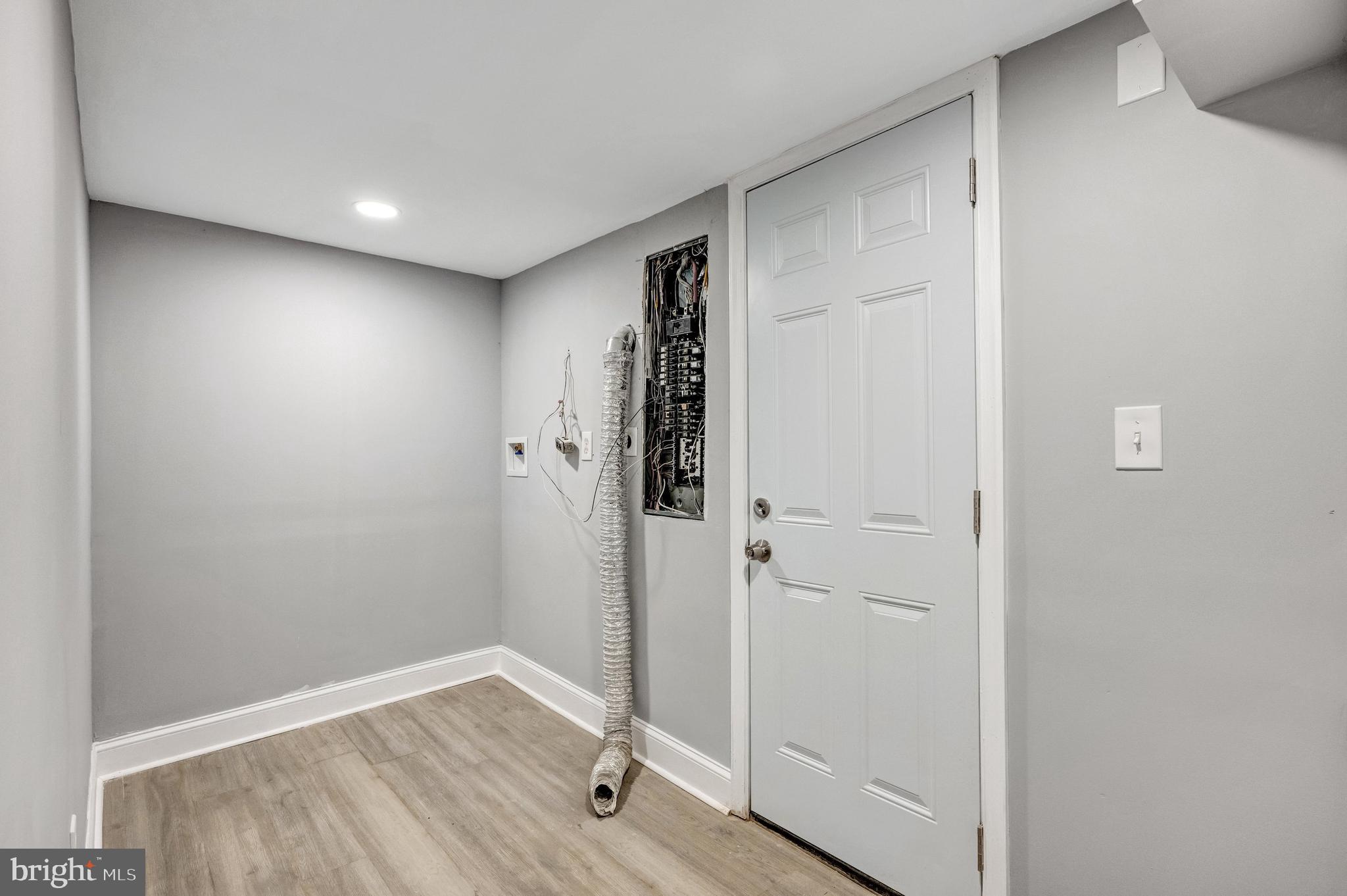 3816 Bonner Road Baltimore, MD 21216 - Photo 33 of 36 a view of empty room with wooden floor