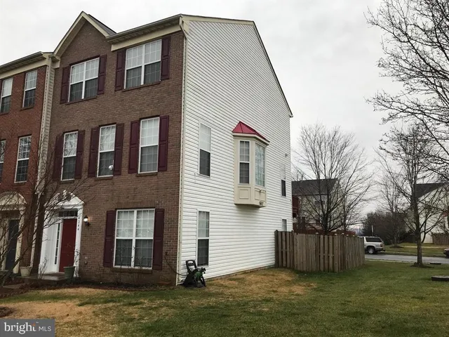 a front view of house with yard