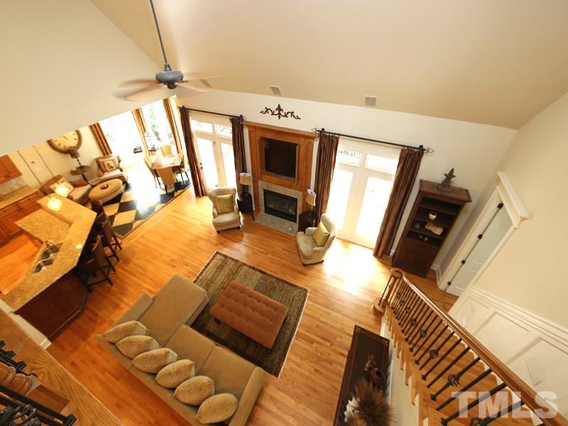 4417 Harbourgate Drive Raleigh, NC 27612 - Photo 18 of 25 A view of the main living space from the balcony/hall above.