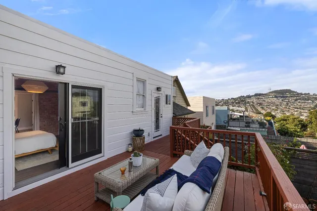 a view of balcony deck and patio