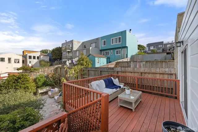 a view of balcony with furniture