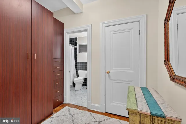 a view of front door and bedroom