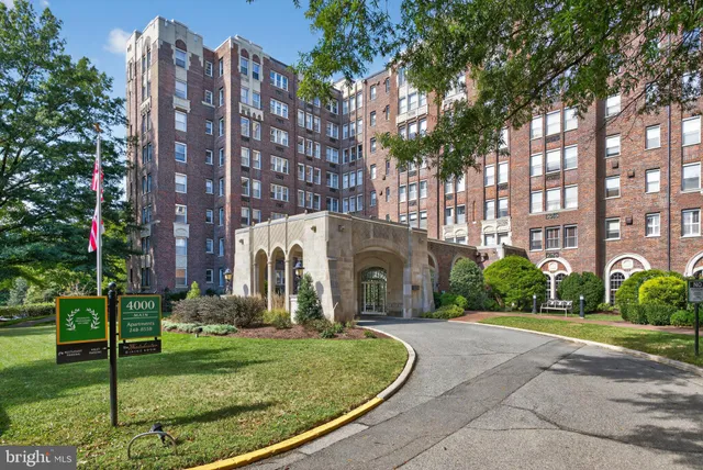 a view of a building with a yard