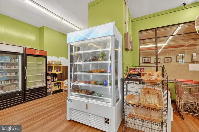 a view of an entryway with furniture and toys