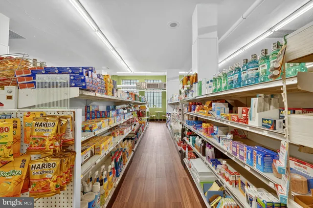 a reading room with furniture and book shelf