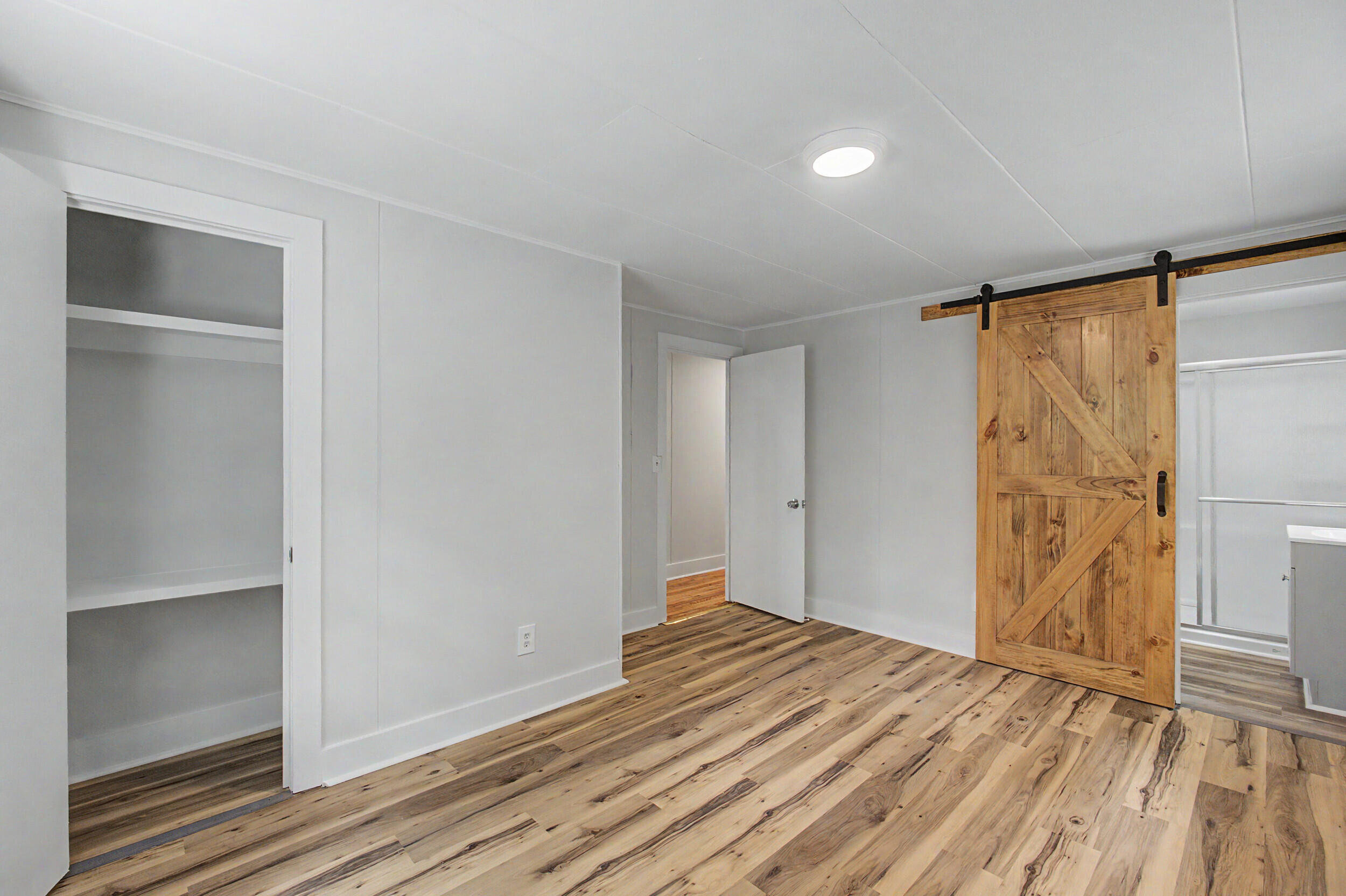 3016 Wagener Road Aiken, SC 29801 - Photo 22 of 29 a view of empty room with wooden floor and fan