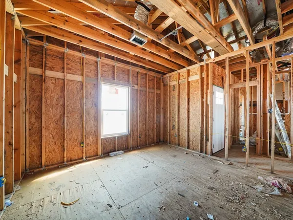 a view of a bathroom with a shower and a sink