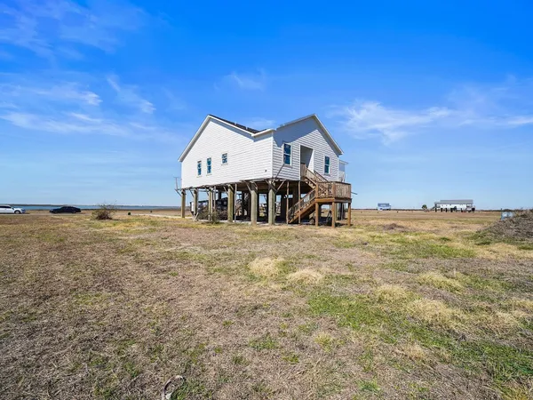 a view of a house with a ocean view