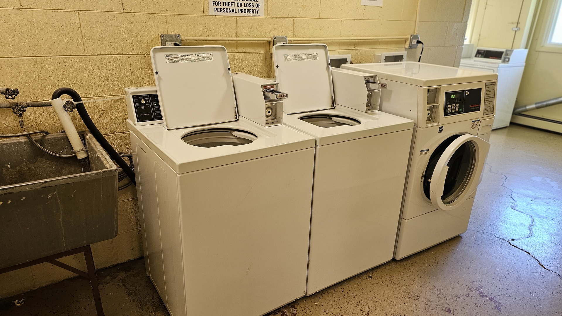 9446 Dee Road, Unit 2E Des Plaines, IL 60016 - Photo 35 of 37 a utility room with dryer and washer