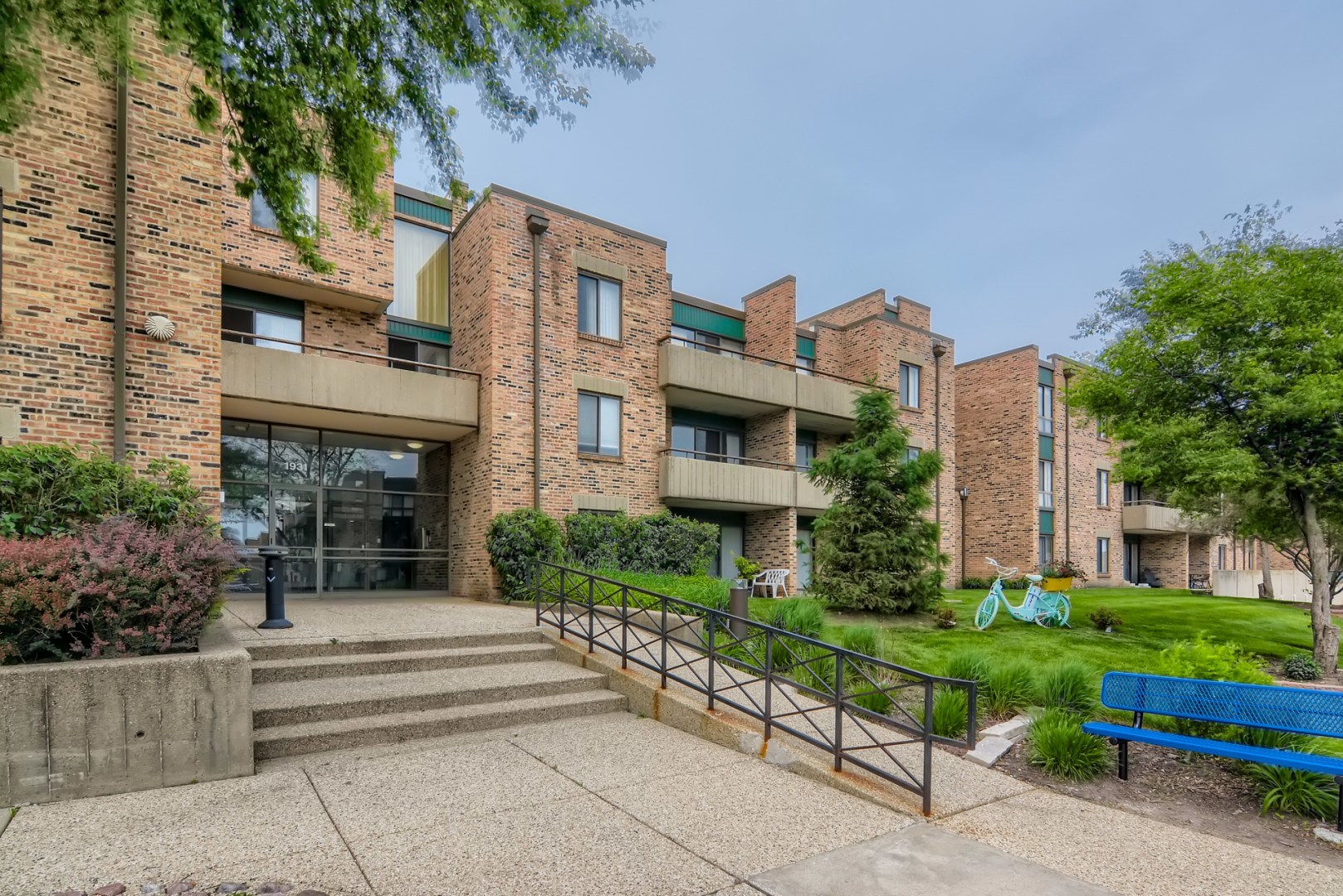 1931 Prairie Square, Unit 331 Schaumburg, IL 60173 - Photo 1 of 19 a front view of a house with a garden