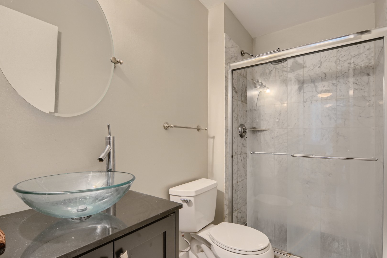 1931 Prairie Square, Unit 331 Schaumburg, IL 60173 - Photo 16 of 19 a bathroom with a sink toilet and a mirror