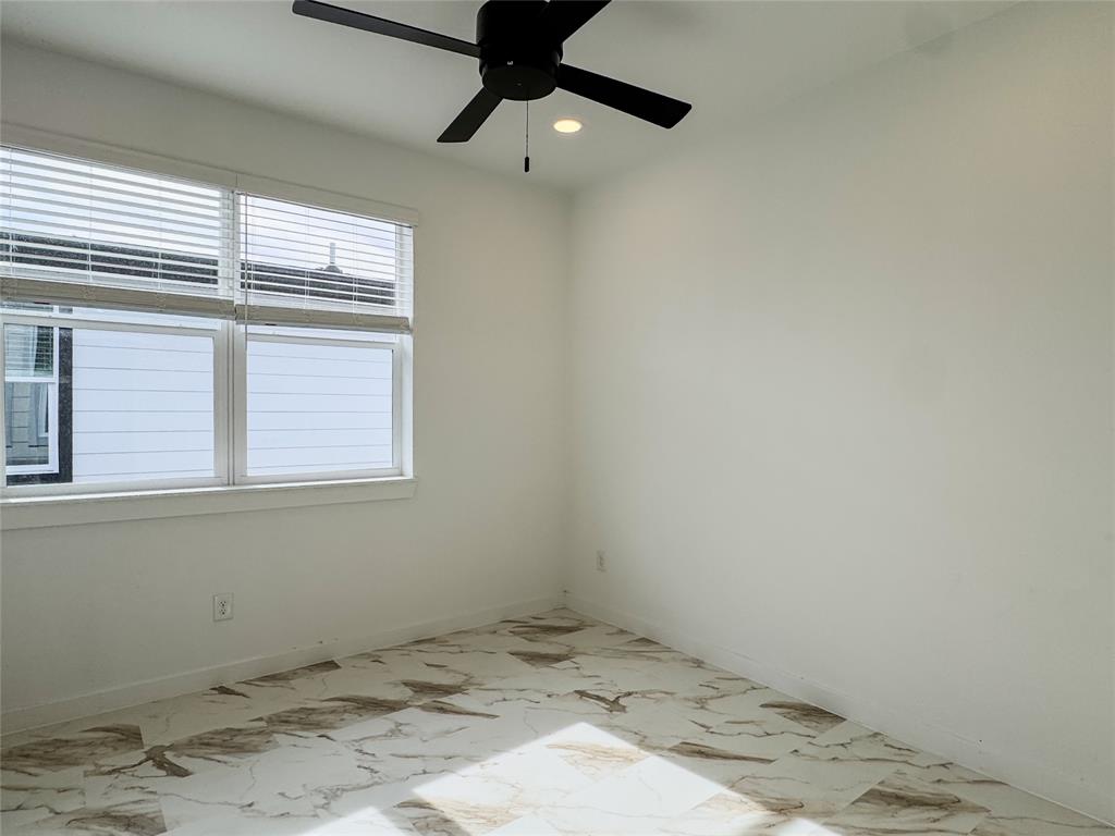 350 Lucy Road Greenville, TX 75402 - Photo 11 of 16 a view of a window in an empty room