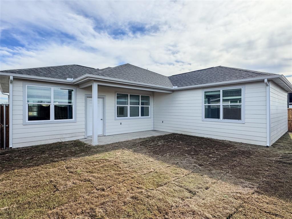350 Lucy Road Greenville, TX 75402 - Photo 16 of 16 a house with trees in the background