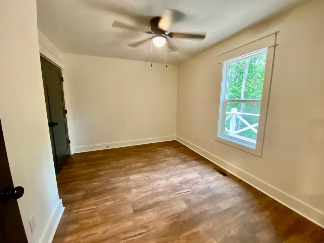 265 Rock Quarry Way Counce, TN 38326 - Photo 14 of 17 a view of an empty room with a window