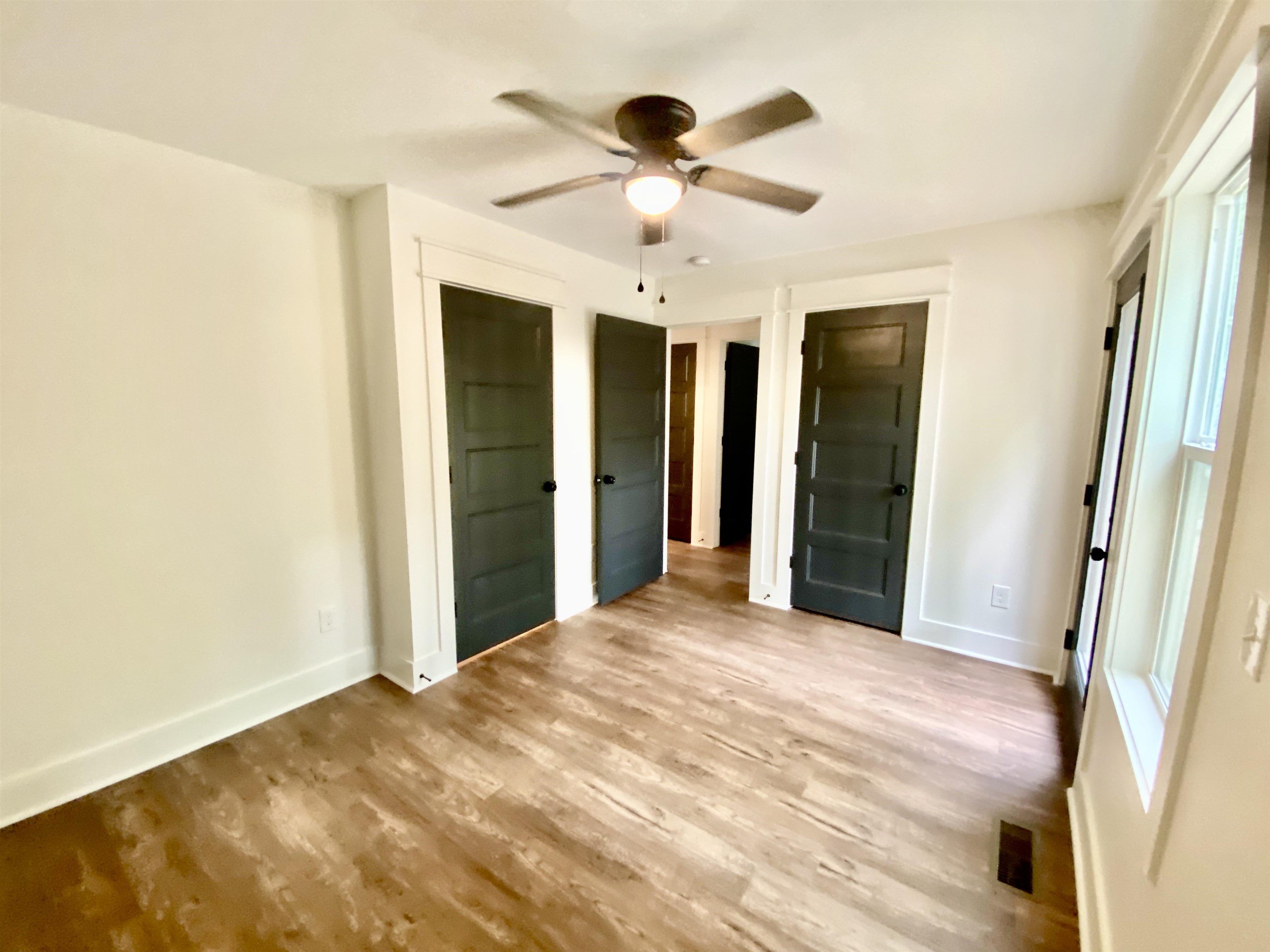 265 Rock Quarry Way Counce, TN 38326 - Photo 10 of 17 a view of an empty room with a window